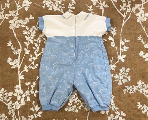 baby dior vintage drummer boys outfit|Dior baby swim shorts.